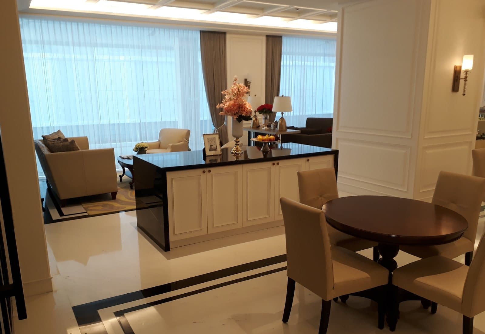 Marble flooring in a residential living and dining suite